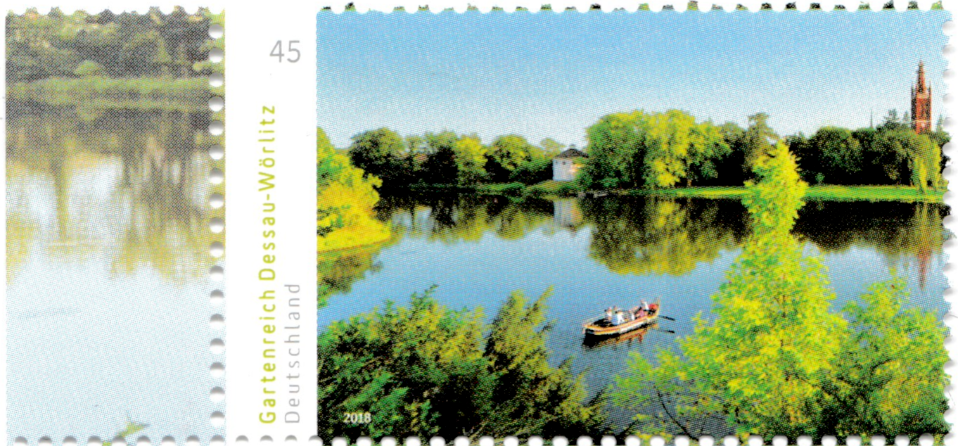 A 2018 stamp from Germany, featuring a ladscape photo of the garden pond of Dessau-Wörlitz